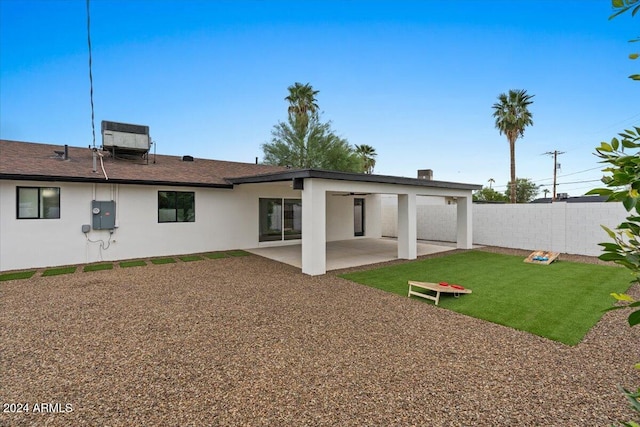 rear view of house featuring a patio area