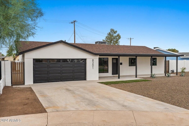 single story home with a garage