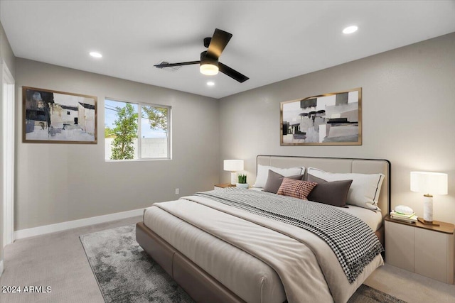 carpeted bedroom featuring ceiling fan