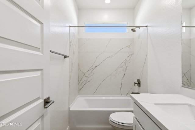 full bathroom featuring vanity, toilet, and tiled shower / bath