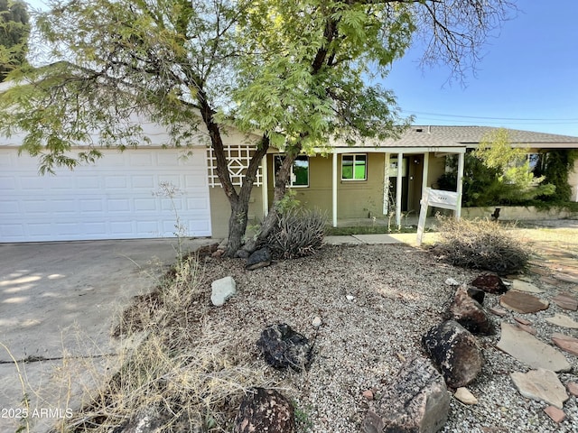 8257 E Cypress St, Scottsdale, AZ 85257 - ranch-style home featuring concrete driveway, concrete block siding, and an attached garage