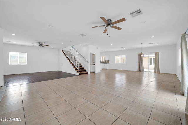 unfurnished room featuring stairs, recessed lighting, visible vents, and light tile patterned floors