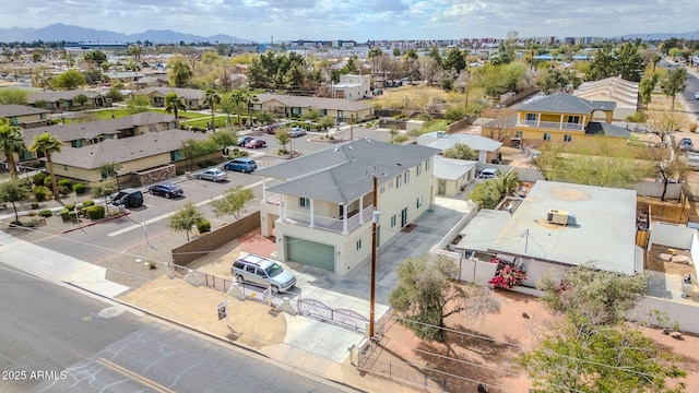 birds eye view of property with a residential view and a mountain view