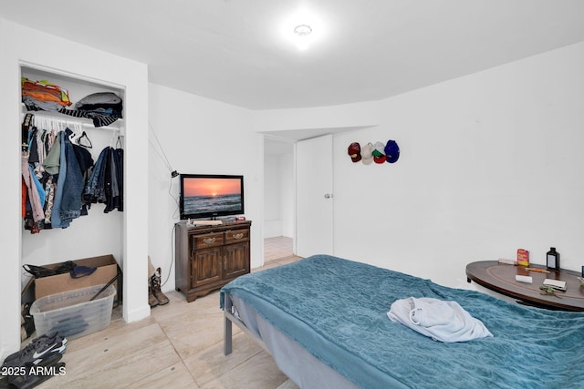 bedroom featuring light tile patterned floors