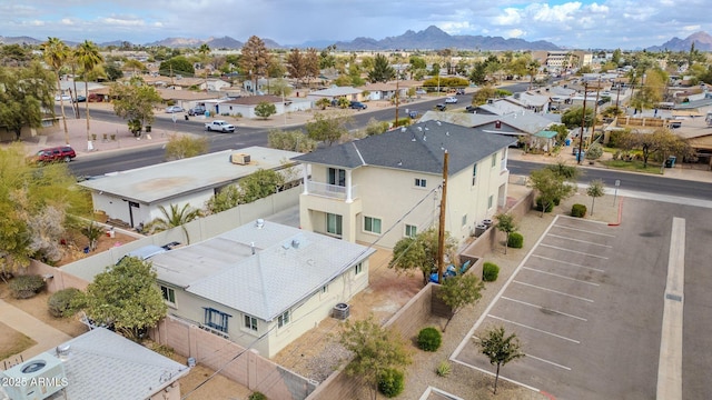 drone / aerial view featuring a mountain view and a residential view