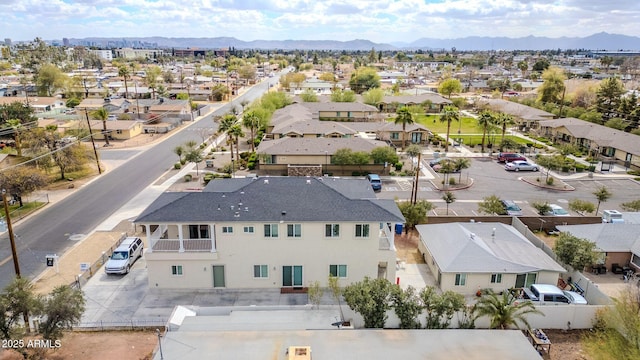 aerial view featuring a residential view and a mountain view