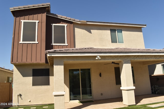 back of house featuring a patio and ceiling fan