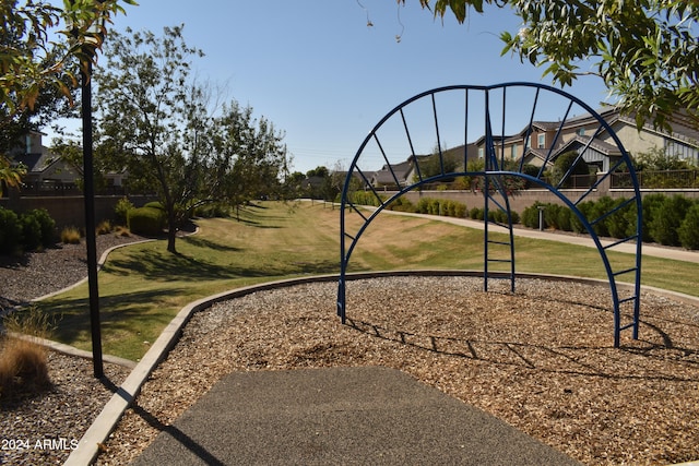 view of community with a playground and a yard