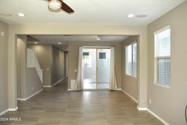 spare room with ceiling fan