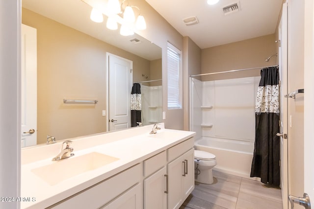 full bathroom featuring shower / bath combination with curtain, vanity, tile patterned flooring, and toilet