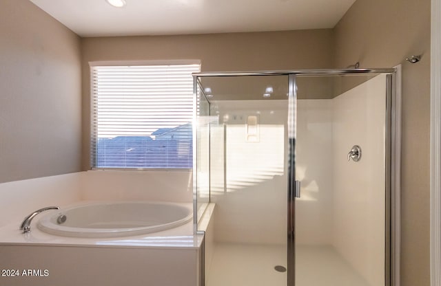 bathroom with plus walk in shower