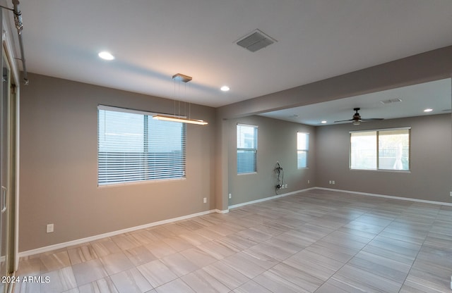 empty room with ceiling fan