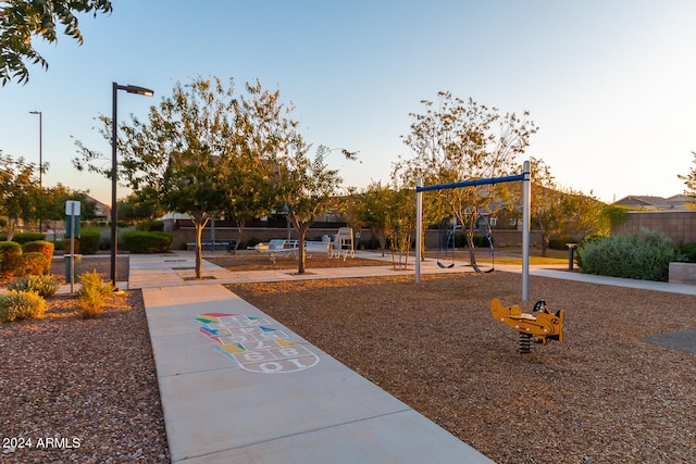 view of playground at dusk