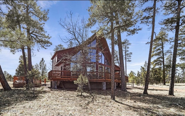 rear view of property with a deck