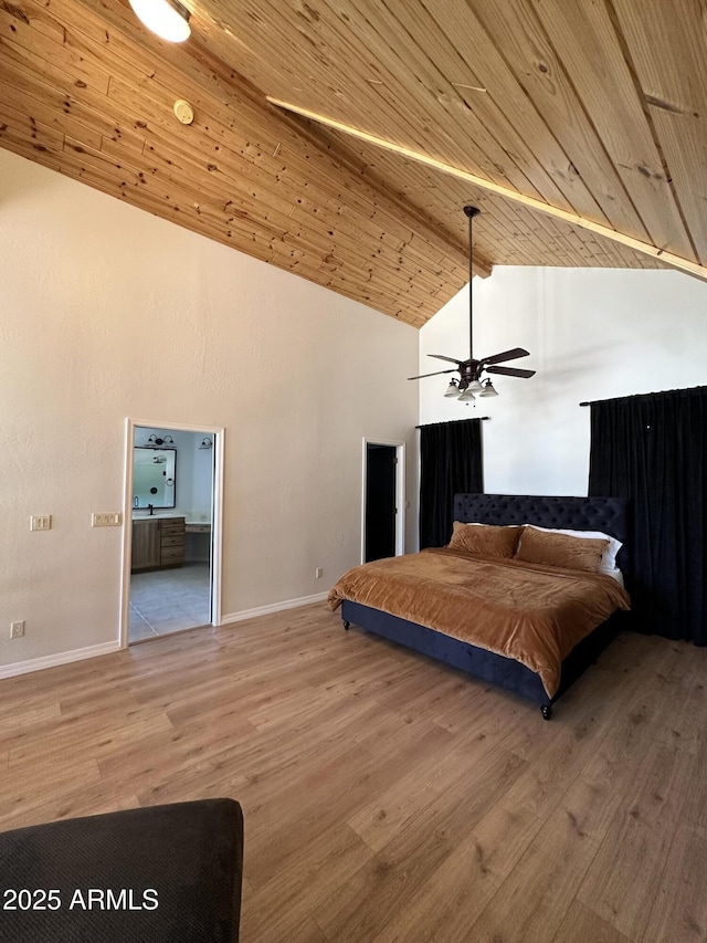 bedroom featuring wooden ceiling, wood finished floors, baseboards, and high vaulted ceiling