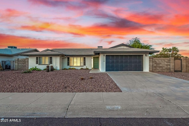 ranch-style home with a garage