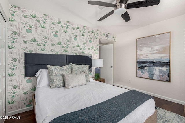 bedroom featuring dark hardwood / wood-style flooring and ceiling fan