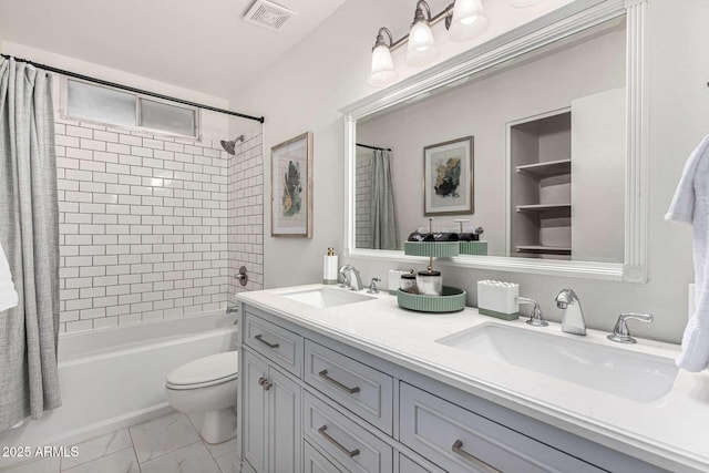 full bathroom with vanity, built in shelves, shower / bath combo with shower curtain, and toilet