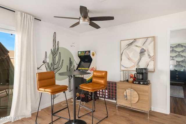 interior space featuring hardwood / wood-style flooring and ceiling fan