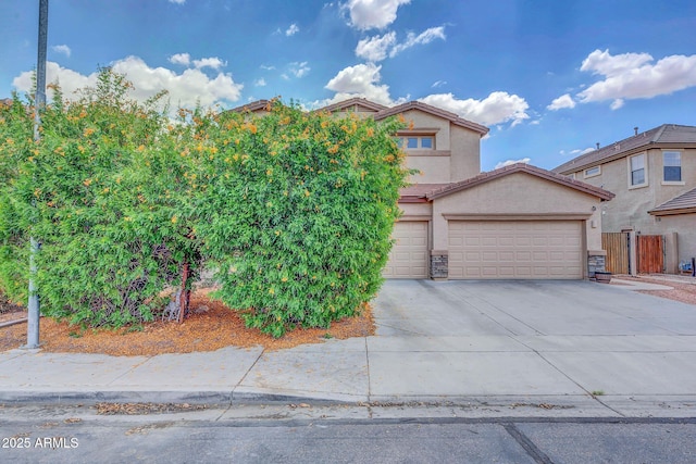 10613 E Knowles Ave, Mesa, AZ 85209 - view of front of house featuring driveway, stucco siding, an attached garage, and a tiled roof