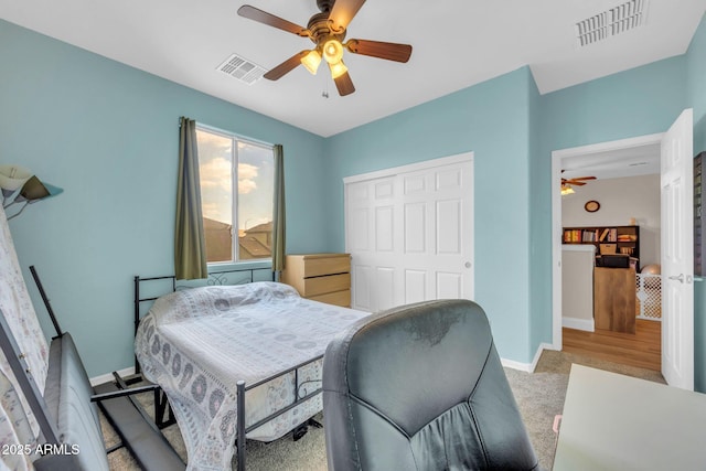 10613 E Knowles Ave, Mesa, AZ 85209 - bedroom featuring a closet, baseboards, light carpet, and ceiling fan