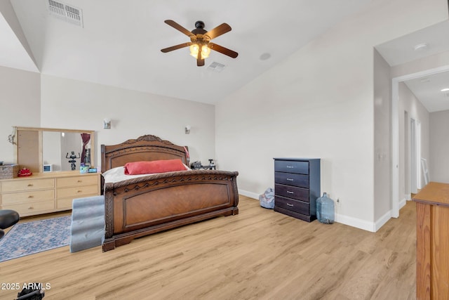 10613 E Knowles Ave, Mesa, AZ 85209 - bedroom featuring wood finished floors, baseboards, vaulted ceiling, and a ceiling fan
