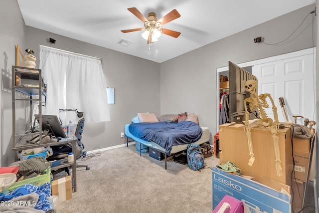 10613 E Knowles Ave, Mesa, AZ 85209 - carpeted bedroom with a closet, a ceiling fan, a walk in closet, and baseboards