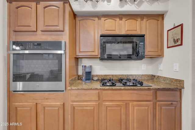 10613 E Knowles Ave, Mesa, AZ 85209 - kitchen featuring black appliances, light stone countertops, and light brown cabinets