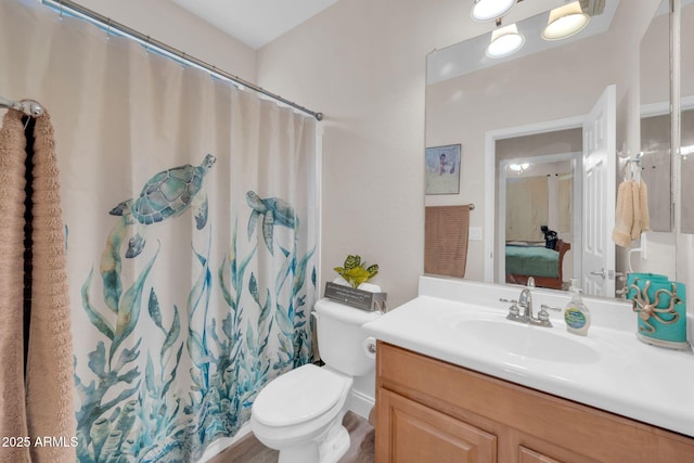 10613 E Knowles Ave, Mesa, AZ 85209 - bathroom with vanity, toilet, a shower with curtain, and connected bathroom