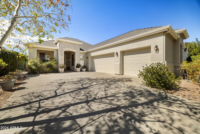 view of front of home with a garage