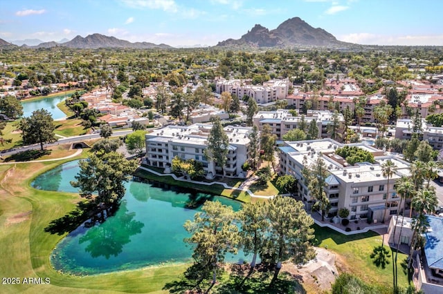 aerial view featuring a water and mountain view