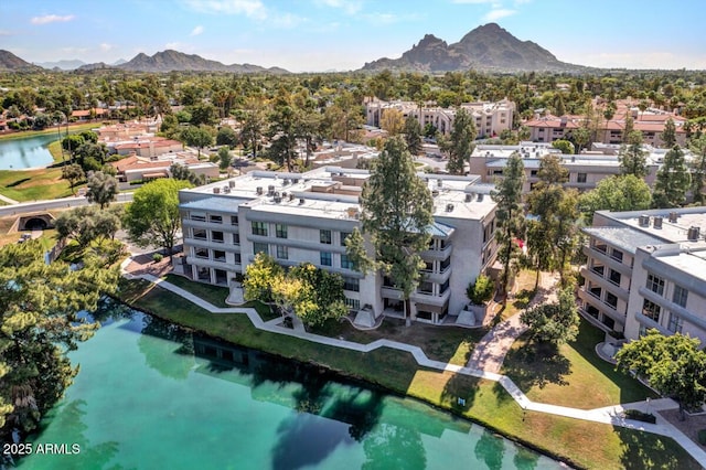 bird's eye view with a residential view and a water and mountain view