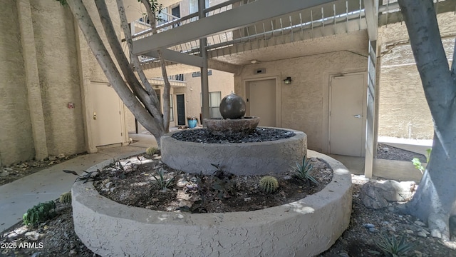 exterior space with stucco siding