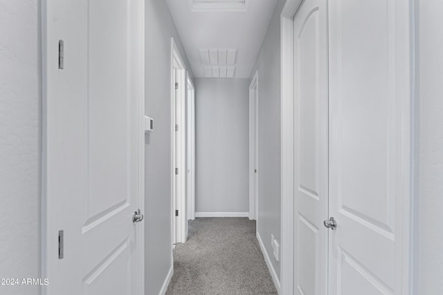 corridor with light carpet