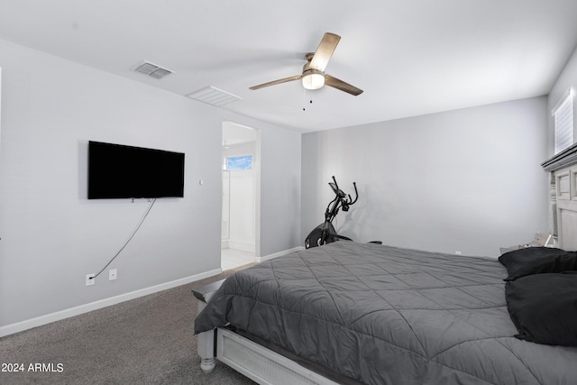 bedroom featuring ceiling fan and carpet