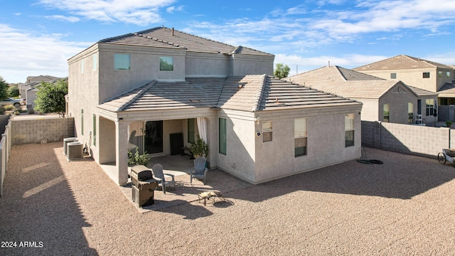 back of property featuring a patio area and central AC unit