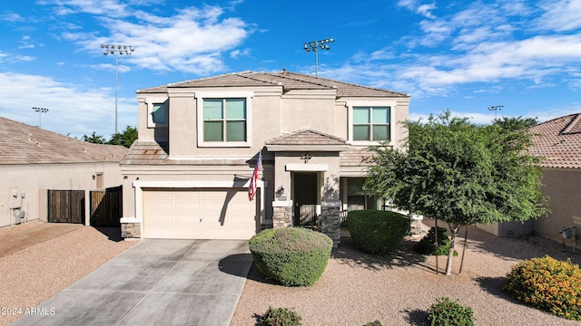 view of front of property with a garage