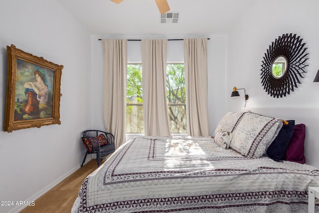 carpeted bedroom featuring ceiling fan