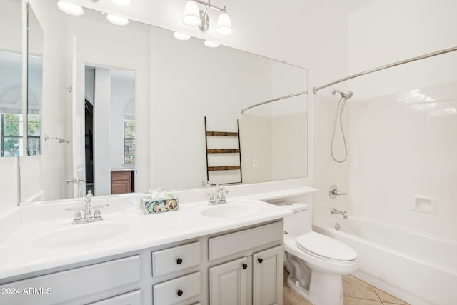 full bathroom with tile patterned floors, vanity, bathing tub / shower combination, and toilet