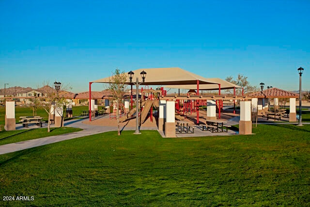 view of play area featuring a lawn