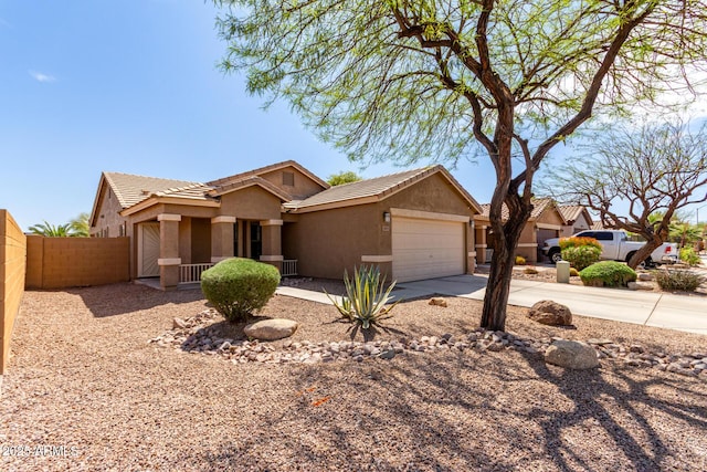 single story home featuring a tiled roof, a garage, fence, stucco siding, and driveway