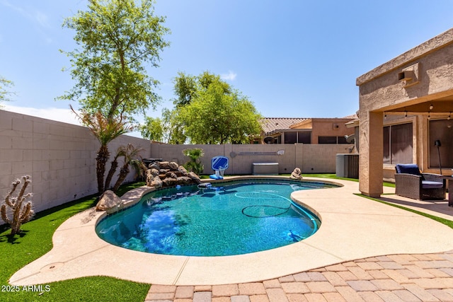 view of swimming pool featuring a patio, a fenced backyard, and a fenced in pool
