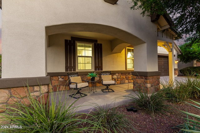 property entrance featuring a garage