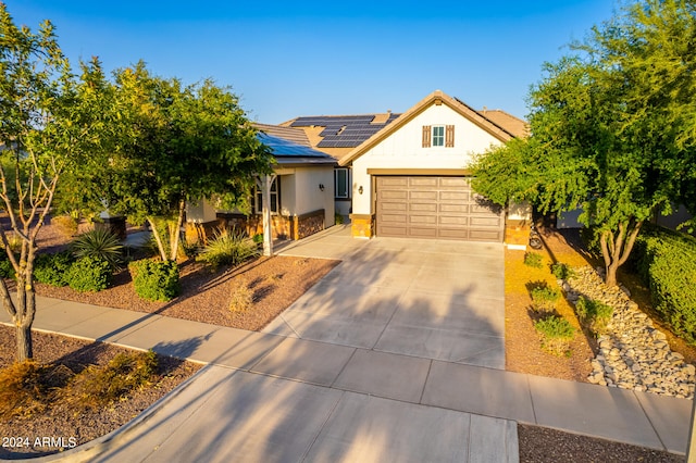 view of front of house with solar panels