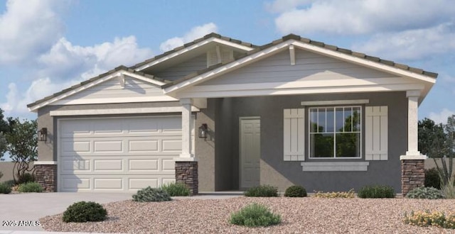 craftsman-style house featuring an attached garage, driveway, and stucco siding