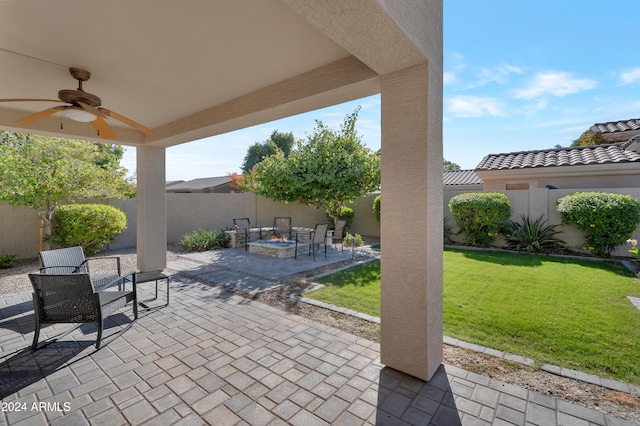 view of patio featuring ceiling fan