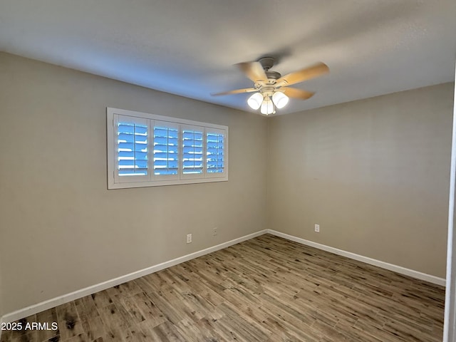 5525 E Thomas Rd Unit C2, Phoenix, AZ 85018 - spare room featuring wood finished floors and a ceiling fan