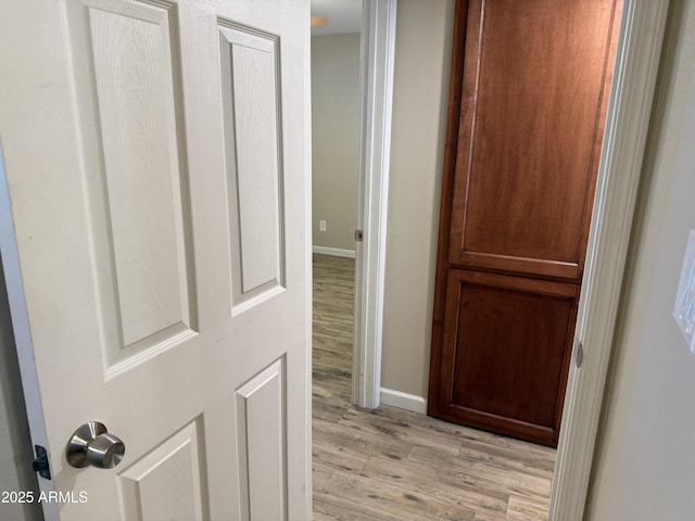 5525 E Thomas Rd Unit C2, Phoenix, AZ 85018 - hall with light wood finished floors and baseboards