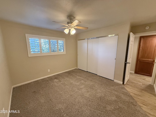 5525 E Thomas Rd Unit C2, Phoenix, AZ 85018 - unfurnished bedroom featuring a closet, ceiling fan, and light carpet