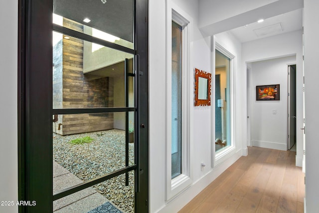 hall featuring wood-type flooring